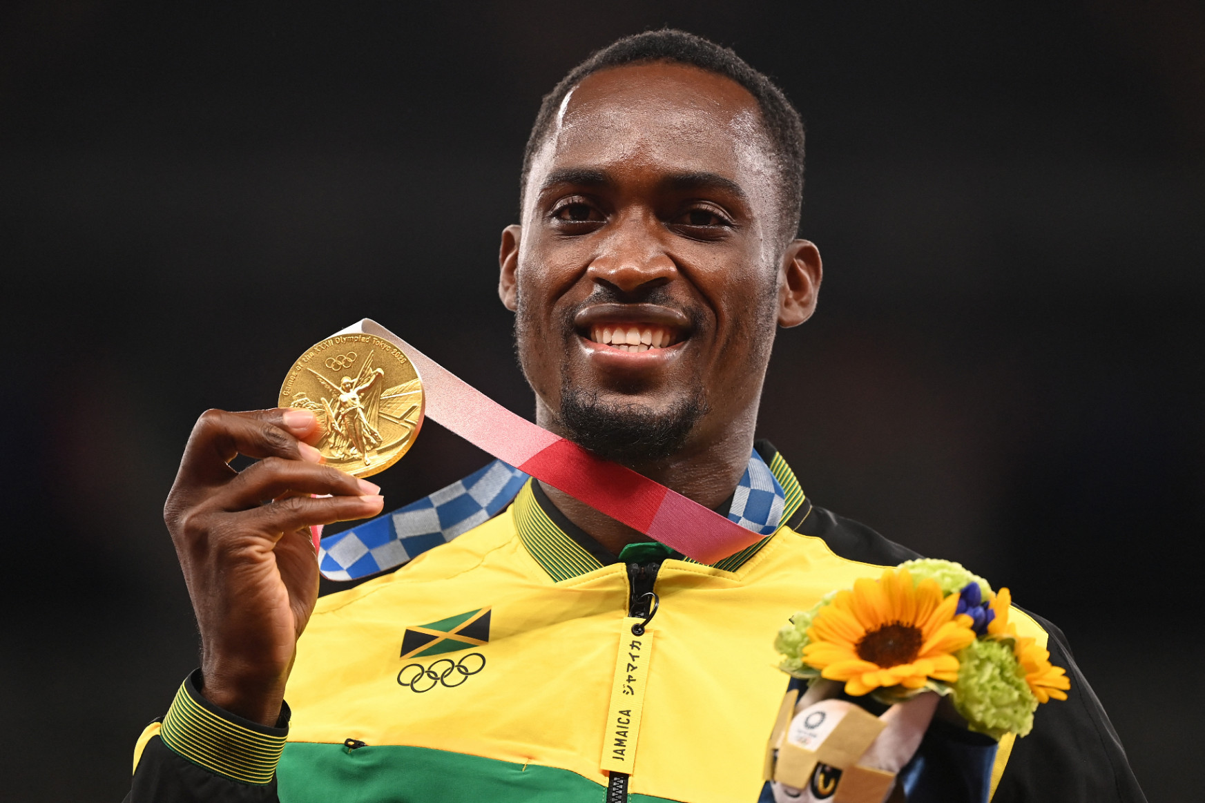 Az olimpiai bajnok atléta és Jamaica örökre hálás az önkéntesnek, aki kifizette a taxiját a döntő előtt